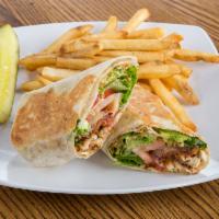 Chicken Bacon Avocado Wrap · Choice of meat with romaine lettuce, tomato, bacon, fresh avocado, Swiss cheese and chipotle...