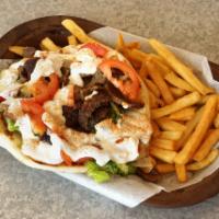Gyro Sandwich Meal · Pita with gyro meat, lettuce, tomato, onion, and cucumber sauce. Includes fries and a pop.