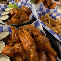 Chicken Wings · Jumbo wings and drumettes smothered in your choice of sauce. Served with bleu cheese or ranc...