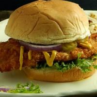 The Trick Shot Tenderloin · An extra-large portion of hand-breaded pork tenderloin served on a giant bun. Add cheese or ...
