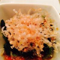 Oshitashi Spinach Salad · Steamed spinach with ponzu sauce, sesame oil, bonito flakes and sesame seed on top.