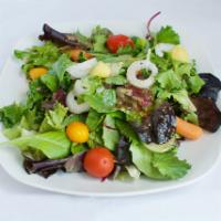 House Salad · Mixed greens, onions, tomatoes, carrots and cucumbers.