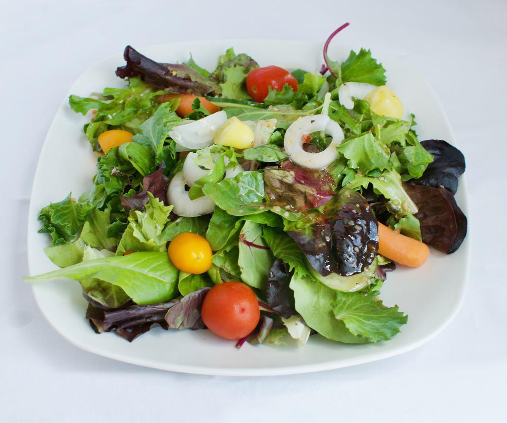House Salad · Mixed greens, onions, tomatoes, carrots and cucumbers.