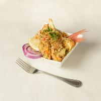 Vegetable Dum Biryani · Basmati rice and vegetables flavored with saffron cooked on low heat.