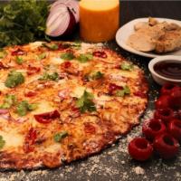 BBQ Chicken Pizza · Roasted chicken, BBQ sauce, smoked mozzarella, peppadews, red onions, cilantro.