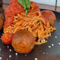 SPAGHETTI MEATBALLS · Brothers meatballs, homemade tomato sauce, fresh basil and cheese over spaghetti