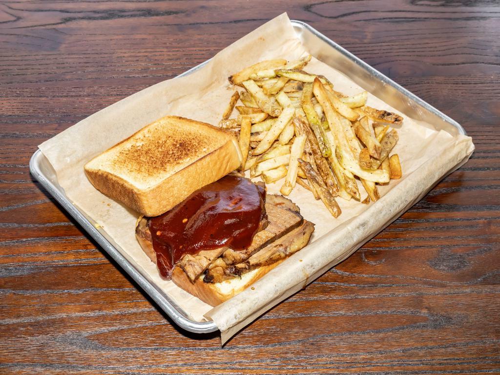 Brisket Sandwich · Brisket served with homemade BBQ sauce on Texas toast.