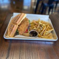 Chicken Waffle Sandwich · Buttermilk battered fried chicken breast in a Belgian waffle with lettuce, tomato, and onion...