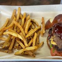 Ram Pa Specialty BBQ Burger · 8 oz. black Angus, brisket on top, American cheese, applewood smoked bacon, fresh tomatoes, ...