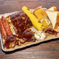 BBQ Platter · Ribs, hot sausage, chicken and pork slider, sliced brisket, corn on the cob, coleslaw and co...