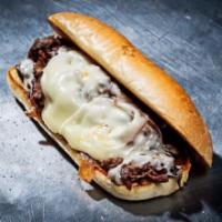 Classic Cheesesteak · Grilled Ribeye, Caramelized Onions, and your choice of Smoked Gouda Cheese Sauce or provolon...