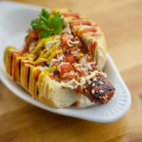 Sonoran Dog · Bacon wrapped Everett's hot dog on a butter toasted brioche bun with refried pinto beans, pi...