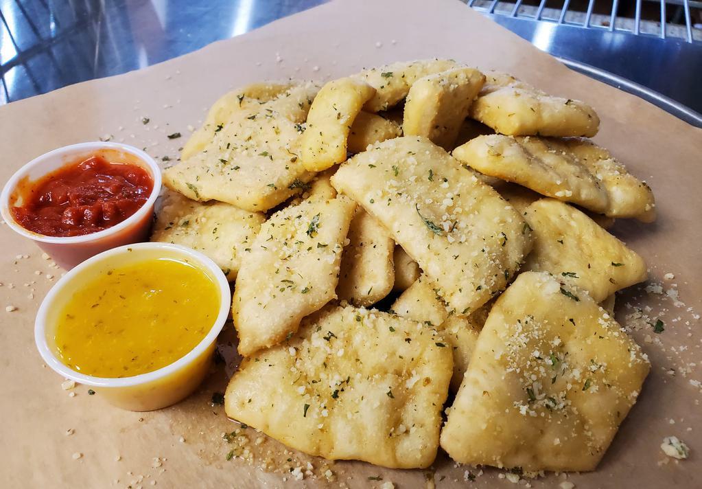 Garlic Butter Bread Bites · Includes 2 dipping sauces.
