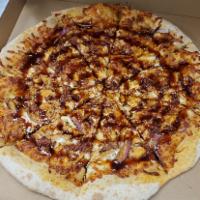 Cajun Q  · BBQ sauce, grilled chicken, bacon, red onions and Cajun spices.