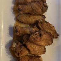 Jumbo Wings · Marinated 24 hours, flash-fried to order, available flavors: Guinness BBQ, Buffalo, or jerk ...