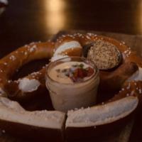 Big Soft Pretzel · Freakishly big Bavarian pretzel with whole grain mustard and beer cheese sauce.