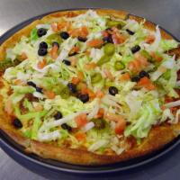 The Taco Pizza or Calzone · Ground beef with taco seasoning, salsa, loads of cheese topped with crisp lettuce, tomatoes,...