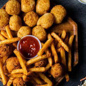 10 Piece Scallop  · Deep fried scallop. Coated in tasty flour and deep fried to golden brown perfection. Served with a side, coleslaw and tartar sauce.