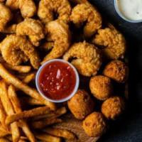 10 Piece Shrimp · Battered and fried divined shrimp. Served with a side, coleslaw and cocktails sauce.