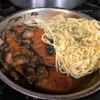Chicken Marsala · Sauteed mushroom on butter cream sauce, and chicken breast served with spaghetti  pasta (Mar...