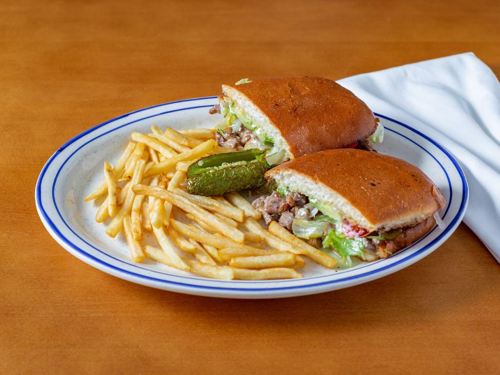 Torta · Mexican sandwich with your choice of meat, beans, mayonnaise, lettuce, onions, tomatoes, and avocado.