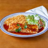 Burrito Fajita · Flour tortilla rolled with steak, chicken fajita, or mix and covered with red sauce. Served ...