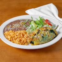 Chiles Rellene Lunch · 1 poblano pepper stuffed with cheese, covered with a spicy roasted tomato salsa and cheese, ...