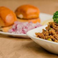 Kheema Pav · Popular street food in India, Robust, peppery curry dish made with minced lamb cooked with o...