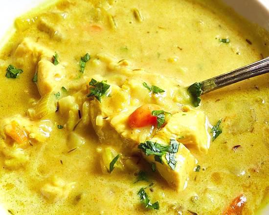 Mulligatawny Soup · Yellow lentil soup with a touch of lemon and black pepper.