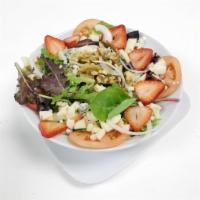 Tropical Salad · Mix greens, apple, strawberry, blue cheese, walnuts, onions and tomatoes.