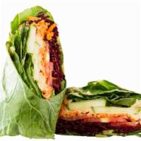 Vegan Collard Wrap · Collard green, carrots, beets, tomatoes, cucumber and hummus.