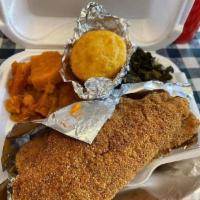 Southern Fried Catfish Dinner · 2 golden brown seasoned filets served with 2 sides.