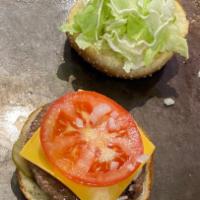 Angus Burger · Pickles, tomato, cheese, mayo, onions, lettuce.