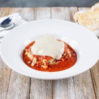 Beef Lasagna · Layers of pasta, mozzarella and our homemade meat sauce.