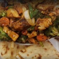 Chicken Stir Fry · Onions, green peppers, mushrooms, carrots, broccoli, and teriyaki sauce.