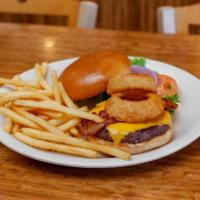 Old West Burger · BBQ sauce, American cheese, bacon, and topped with onion rings. Made with our finest ingredi...