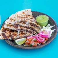 Steak Quesadilla · Cooked tortilla that is filled with steak and folded in half. 
