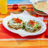 Steak Sope · Includes beans, red and green salsa, meat, lettuce, tomato, cheese, and onion.