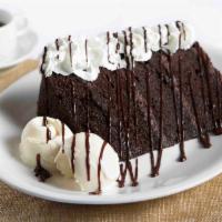 7 Later Chocolate Cake · Colossal layer upon layer of dark, moist chocolate cake sandwiches with our silky smooth cho...