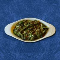 Garbanzo Grove · Chickpeas slow cooked to perfection in a thick ginger, garlic and spinach gravy.