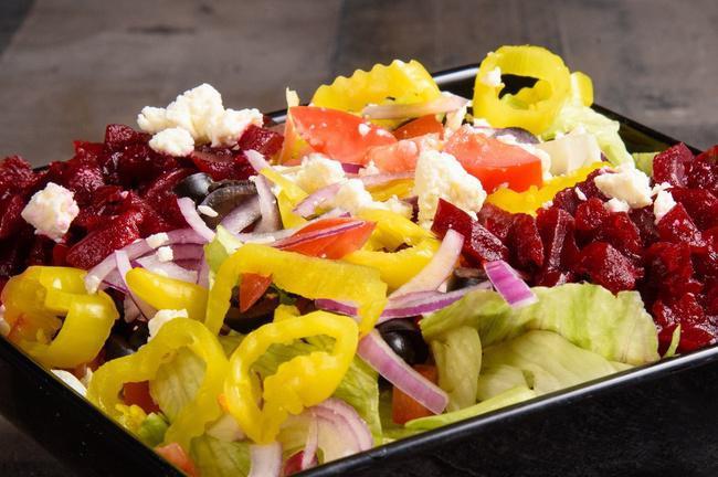 Sm Greek Salad · Lettuce, Tomatoes, Red Onions, Mild Pepper Rings, Feta Cheese, Black Olives & Beets