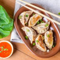Pork Gyoza · 6 pieces of pork dumpling. Choice of pan fried or steamed. Served with special gyoza sauce.