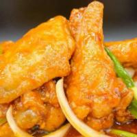 6. Oyster Wings  · 6 pieces. Chicken wings, flour, onion, scallion.