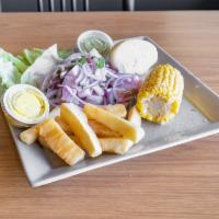 Ceviche · Cold dish of raw tilapia and red onions. Cooked by the juice of lemon, served on a bed of le...
