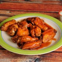 10 Jumbo Chicken Wings · Served with 1 blue cheese or ranch sauce.