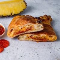 Pepps and Pineapple Calzone · Pepperoni, pineapple, and mozzarella. Served with choice of dipping sauce.
