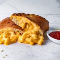 Mac’n Me Crazy Calzone · Mac’n cheese and Monterey jack cheese. Served with choice of dipping sauce.
