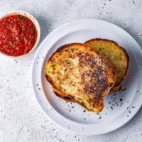 Garlic Parm Toast · Garlic butter-toasted Italian bread, topping with parm cheese, and served with a side of hou...