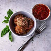 Meatballs · Slow-Cooked in marinara and finished with parmesan cheese.