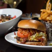 Chipotle BBQ Burger · Cheddar, applewood smoked bacon, 2 onion rings, house-made chipotle mayo.